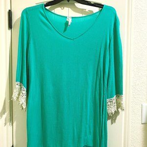 Turquoise Blouse with lace sleeves